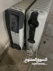  1 زوز دفايات و مكنسة كهربائية