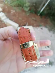  7 ساعة موناليز اصلية مطلية ذهب عليها احجار ألماس