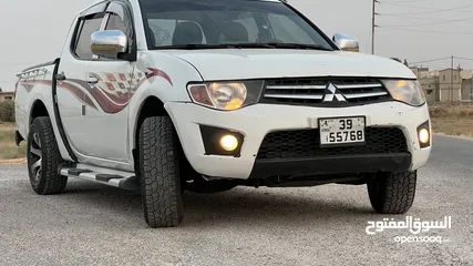  3 ميتسوبيشي L200 واطي دفع خلفي وليس رباعي