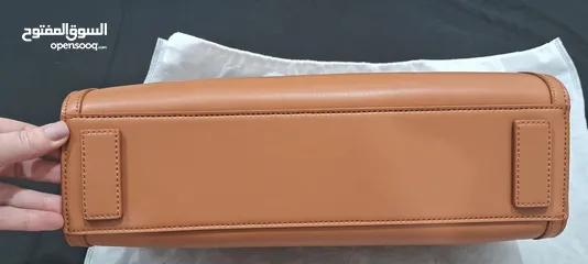  7 tags on new camel handbag unique with detachable strap
