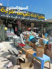  1 رفوف خشب وزجاج وسوبرماركت وقرمه ولوحة اعلانات و معرش زينكو وأبواب سيكريت مظله وألواح خشب تعليق وشبك
