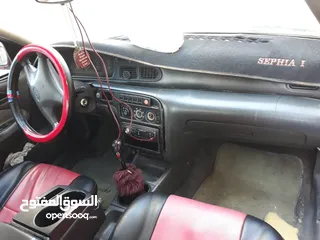  1 كيا سيفيا ون موديل 1995 لون خمري جير عادي للبيع