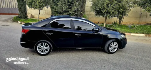  10 كيا فورتي فل مع فتحه سقف وبصمه 2011 اصل برايفت