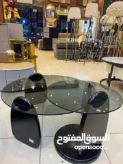  7 طاولة قهوة عصرية بسطح زجاجي أنيييق وتصميم حديث   هالطاولة بتجمع بين التصميم العصري والبساطة الراقية
