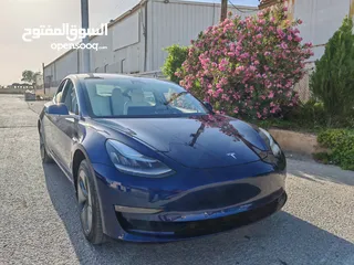  19 Tesla Model 3 Standerd Plus 2020 تيسلا موديل 3 2020 لون كحلي وداخلي ابيض فحص 4 جيد