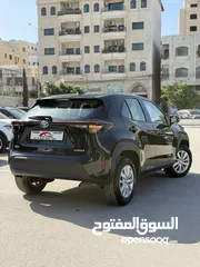  13 تويوتا ياريس كروس ترخيص 2022  محرك 1500 هايبرد  جير أوتوماتيك  172 حصان هاندبريك كهربائي عداد 61000
