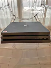  1 ps4 pro with 2 games and 2 controller and charging dock