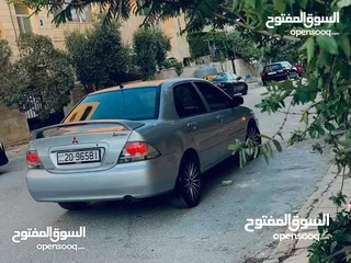  3 Mitsubishi 2011 فل كامل****بدون فتحه.  وارد الشركه.