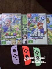  14 نينتندو سويتش مع 5 العاب super mario party و super mario wonder و super mario 3d world و ايد وكنترول