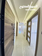  3 شقة طابق اخير مع روف 230 متر وتراس 100 متر على شارعين  طريق المطار خلف المدارس العالمية بسعر مميز
