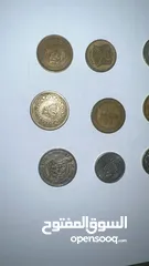  9 عملات اجنبية وطوابع قديمة