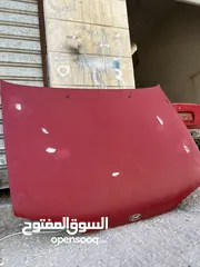  1 غطاء امامي + قشرة خلفي ( اكسنت 95 كوري اصلي).