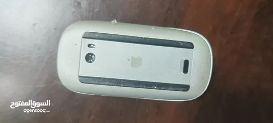  9 i mac with the cartoon and mouse and keyboard