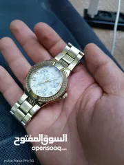  1 ساعة GUESS اصلية شغالة 100%