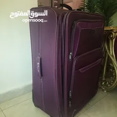 4 شنتة سفر جر لون بنفسجي غامق حجم كبير