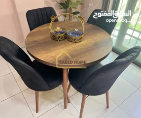  25 طاولة سفرة دائرية مع 4 كراسي سطح الطاولة خشب ملبس فورمايكا – مقاوم للخدوش وسهل التنظيف
