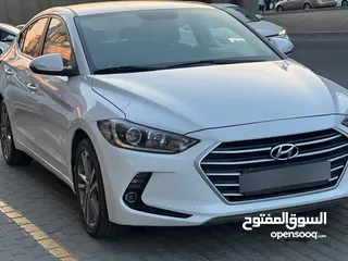  3 هونداي افانتي AD بحالة الوكالة موديل 2018  لون ابيض فحص كامل مالك اول من المنطقه الحرة/ كراسي جلد