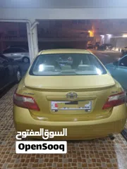  5 تويوتا كامري  2007  GLX  ذهبي تخشيبة وستارة خلفية  شاشة وكاميرا