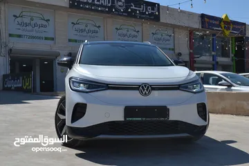  1 VOLKSWAGEN ID.4 CROZZ  PRO BIANO BLACK  2023 لون لؤلؤي فحص كامل