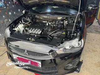  13 لانسر فراشة 2017  7 جيد لون اسود للبيع