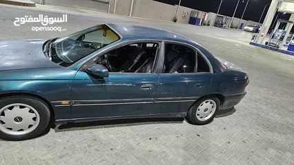  20 اوبل اوميجا للبيع السياره ب حاجه ل صيانه (القير + صنوبرصات) كاوشك جديد كراسي كهرباء السياره فحص خالي