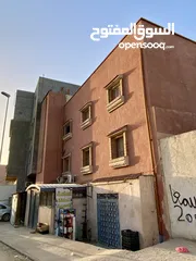  1 مبنى في سوق الجمعة طريق الشط