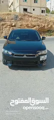 4 متسوبيشي لانسر فراشة موديل 2015 فحص مرفق مع الصور بحالة الوكاااااالة  ماشية 49 الف km  أصلي
