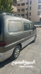  1 باص خدمة توصيل رحلات مطار