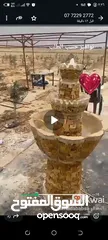  2 نوافير حديقه كبيره ملبسه حجر