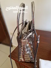  4 Like new Michael Kors crossbody bag metallic colour