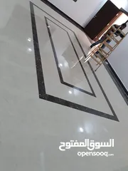  27 بليط وفني تركيب بديل الرخام وبديل الخشب