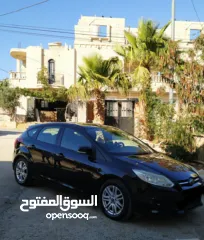  3 فورد فوكس موديل 2014 هاتشباك