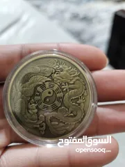  7 3 عملات تذكارية .