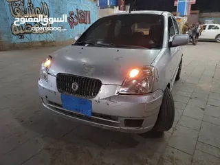  1 كيا مورننق موديل 2004 جير عادي زحاج تماتيك