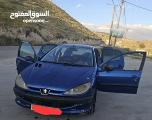  6 بيجو 206 ..2006 ..جير عادي ..بنزين  ماتور 1400