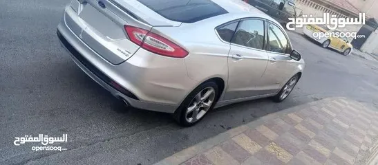  12 فورد فيوجن 2014 هايبرد كلين فحص كامل لون سلفر بحالة الوكالة