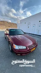  12 تويوتا مطيري كامري عنابي 98 سته سلندر Toyota Camry V6 1998