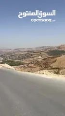  6 أرض مطلة اطلالة لا يمكن إغلاقها بين صافوط والجبيهة تصلح لبناء فيلا محاطة بفلل على شارعين كل الخدمات