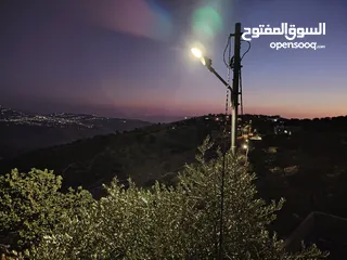  2 ارض للبيع مساحة4300م وعلى الواقع 12دونم تصلح بيت ريفي شاليه ارض زراعيه ويوجد فيها بيت قيد الانشاء