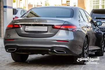  26 Mercedes E200 2021 Amg kit  السيارة وارد و كفالة الشركة و قطعت مسافة 51,000 كم