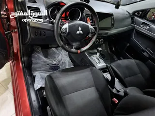  6 ميتسوبيشي لانسر موديل 2015 GT اصلي فحص كامل بحالة الوكاله فل كامل اعلى صنف من فئتها