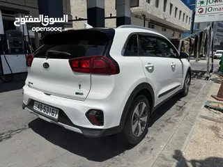  7 كيا نيرو هايبرد 2020 لون ابيض لؤلؤي فحص 4 جيد نظيفة جداً ممشى قليل