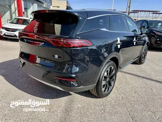  6 BYD Tang اسود اعلى اضافات 7 مقاعد زيرو كهربائي بالكامل