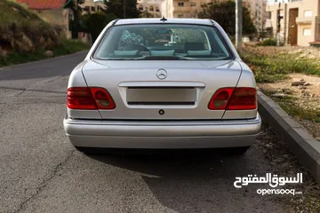  14 مرسيدس E200  موديل 1999 فل مع فتحة