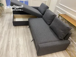  1 L shaped sofa come bed with storage.