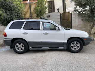  1 هونداي سنتافي 2002 للبيع (لون ابيض) بسعر مغري