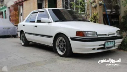  1 mazda sedan 323