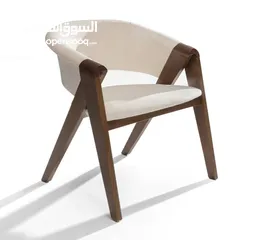  3 انغمس في جمالية الفخامة والأناقة مع كرسي الطعام المودرن بأرجله المنحنية، واجعل تناول الطعام تجربة فر