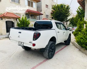  25 ميتسوبيشي L200 2011 + قطع