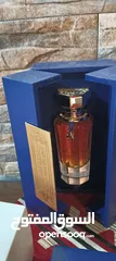  13 عطر خلطه القرشي جديد90مل للرجال والنساء  مع ستاند خشب لون ازرق